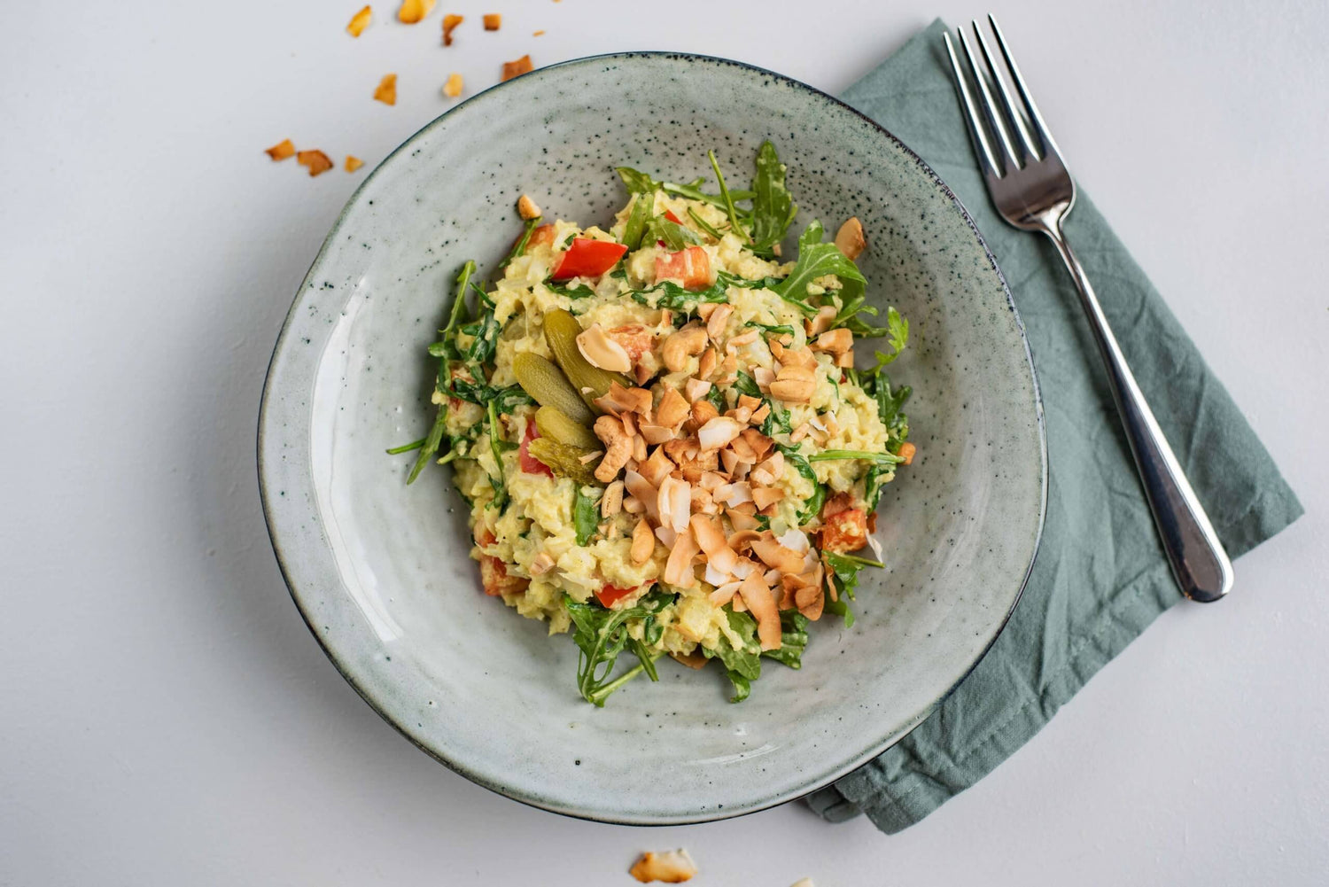 Bloemkool-rucolastamppot met geroosterde kokosvlokken